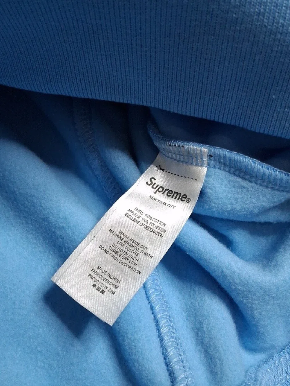Supreme Light Blue Zip-Up Hoodie with Racing Patches